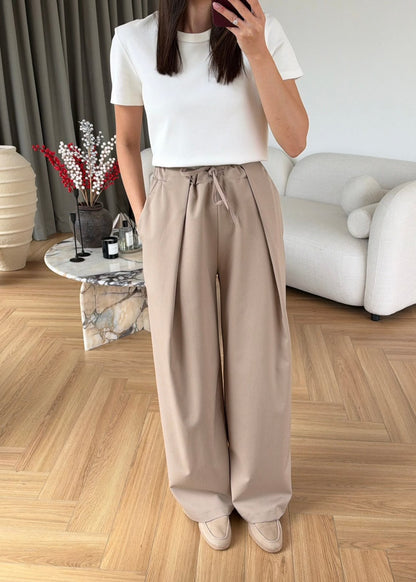 Relaxed Pleated Wide Leg Trousers In Beige